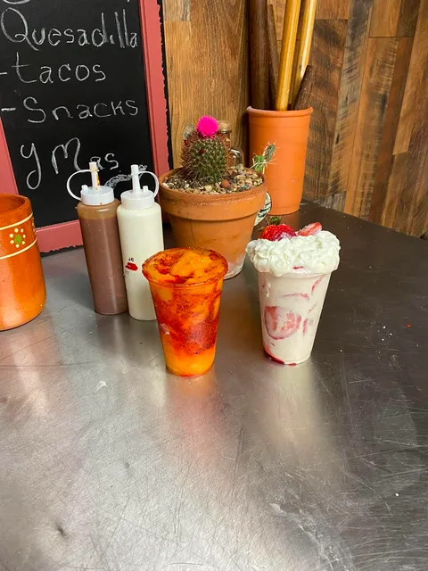 Refreshing Mexican drinks — chamoyada and fresas con crema served ice cold