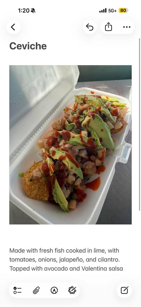 Fresh fish ceviche cooked in lime juice, topped with avocado and Valentina salsa