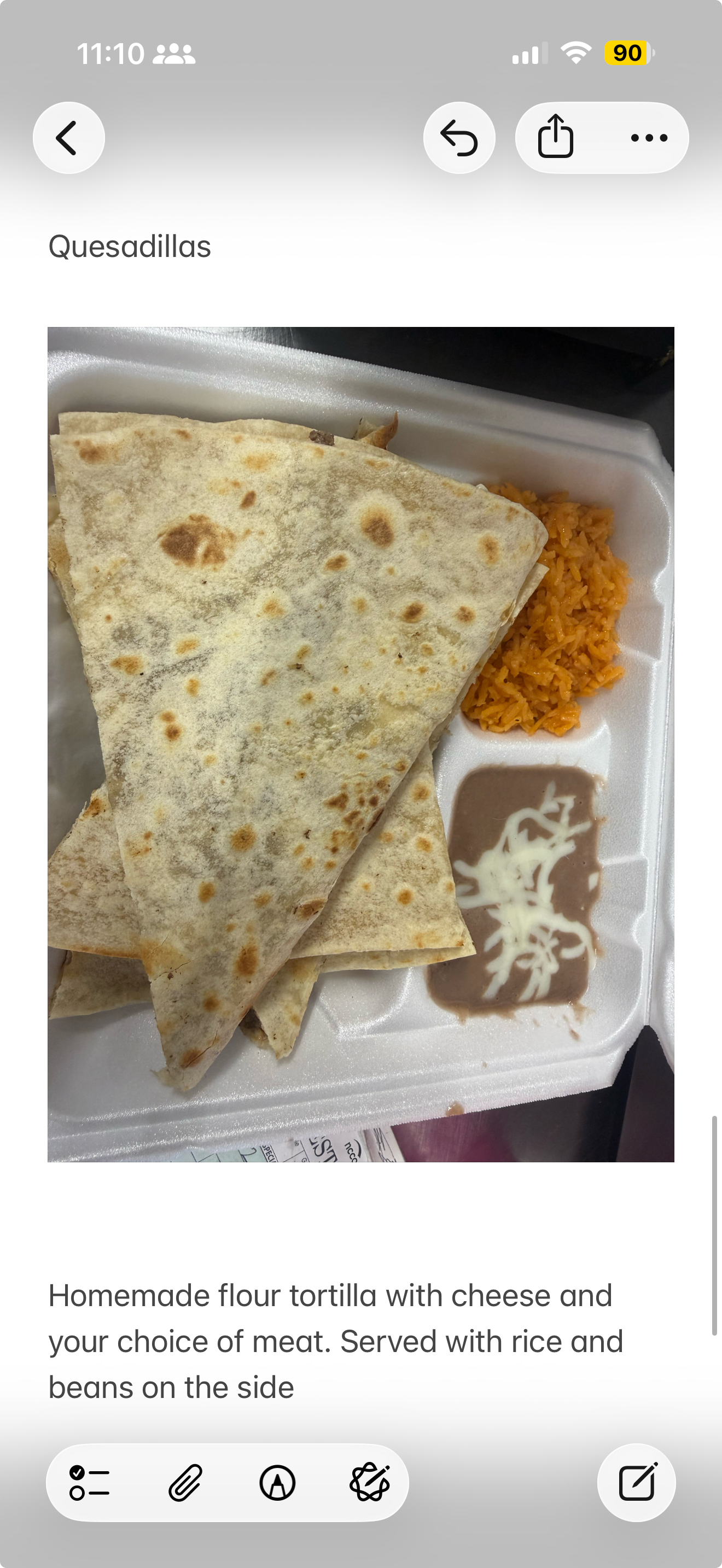 Homemade flour tortilla quesadilla served with rice and beans on the side